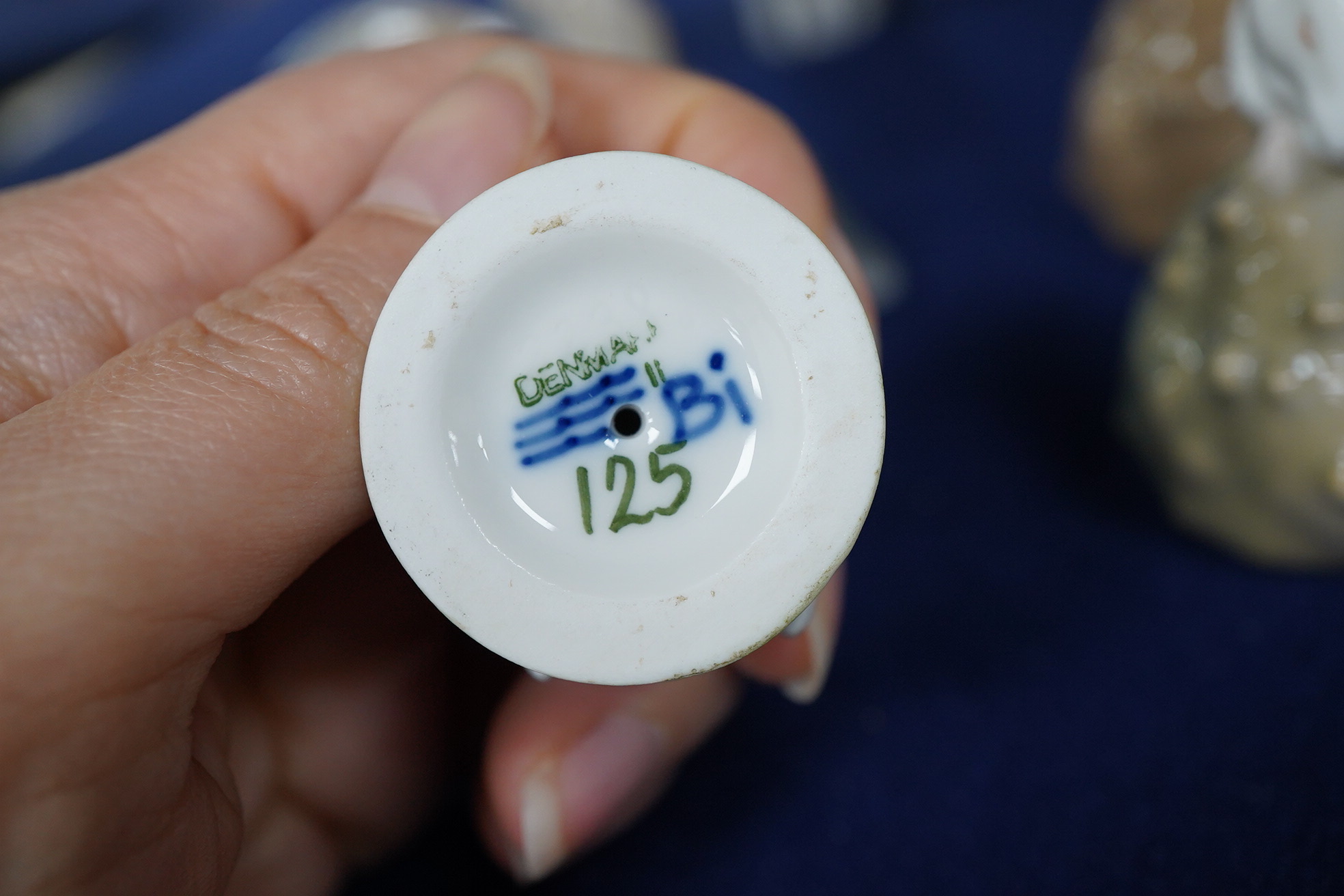 A collection of Royal Copenhagen figures of mice, birds and two other figures